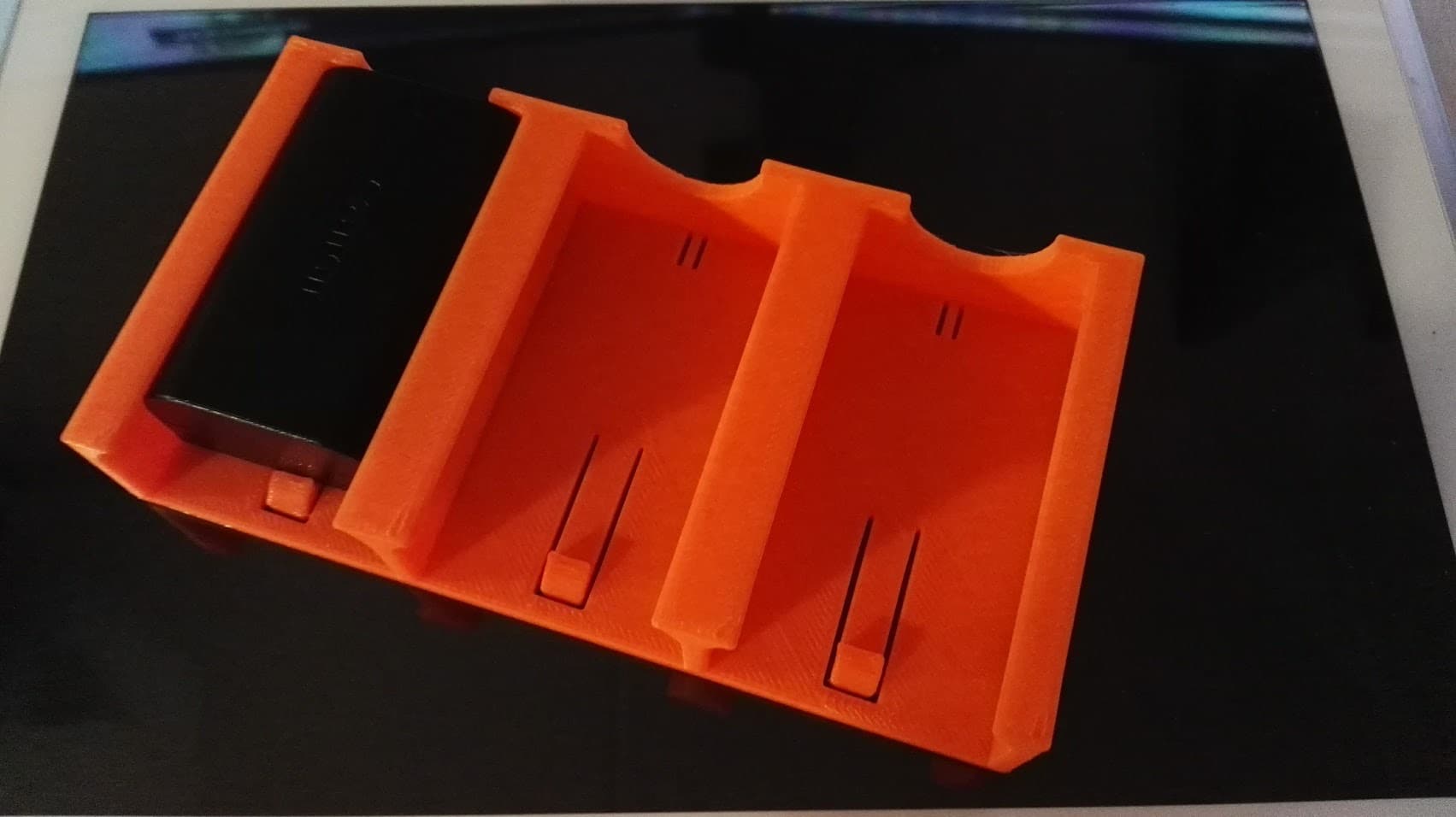 Canon LP-E6 battery case with batteries inserted