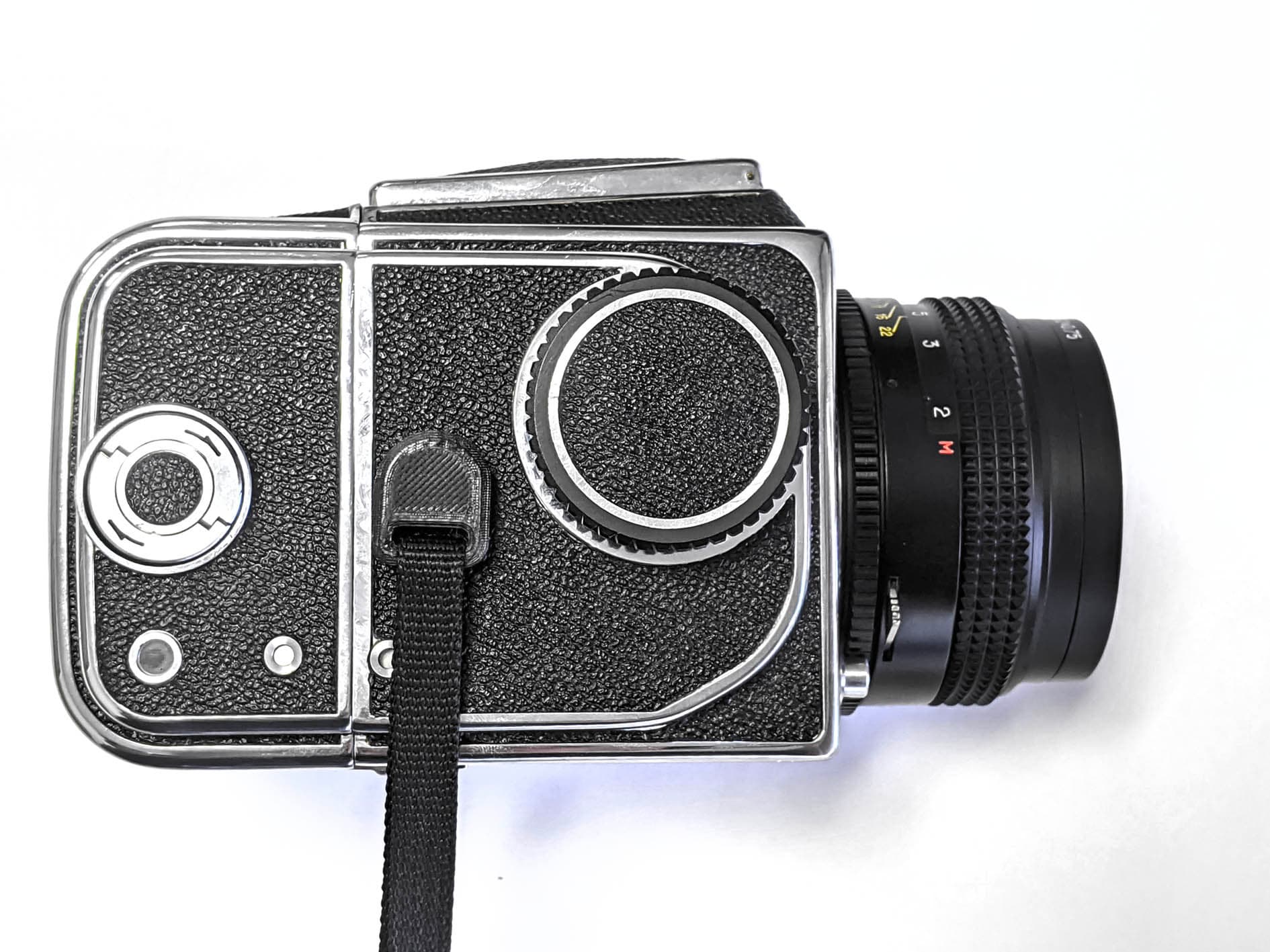 Hasselblad strap lug fitted on a camera body
