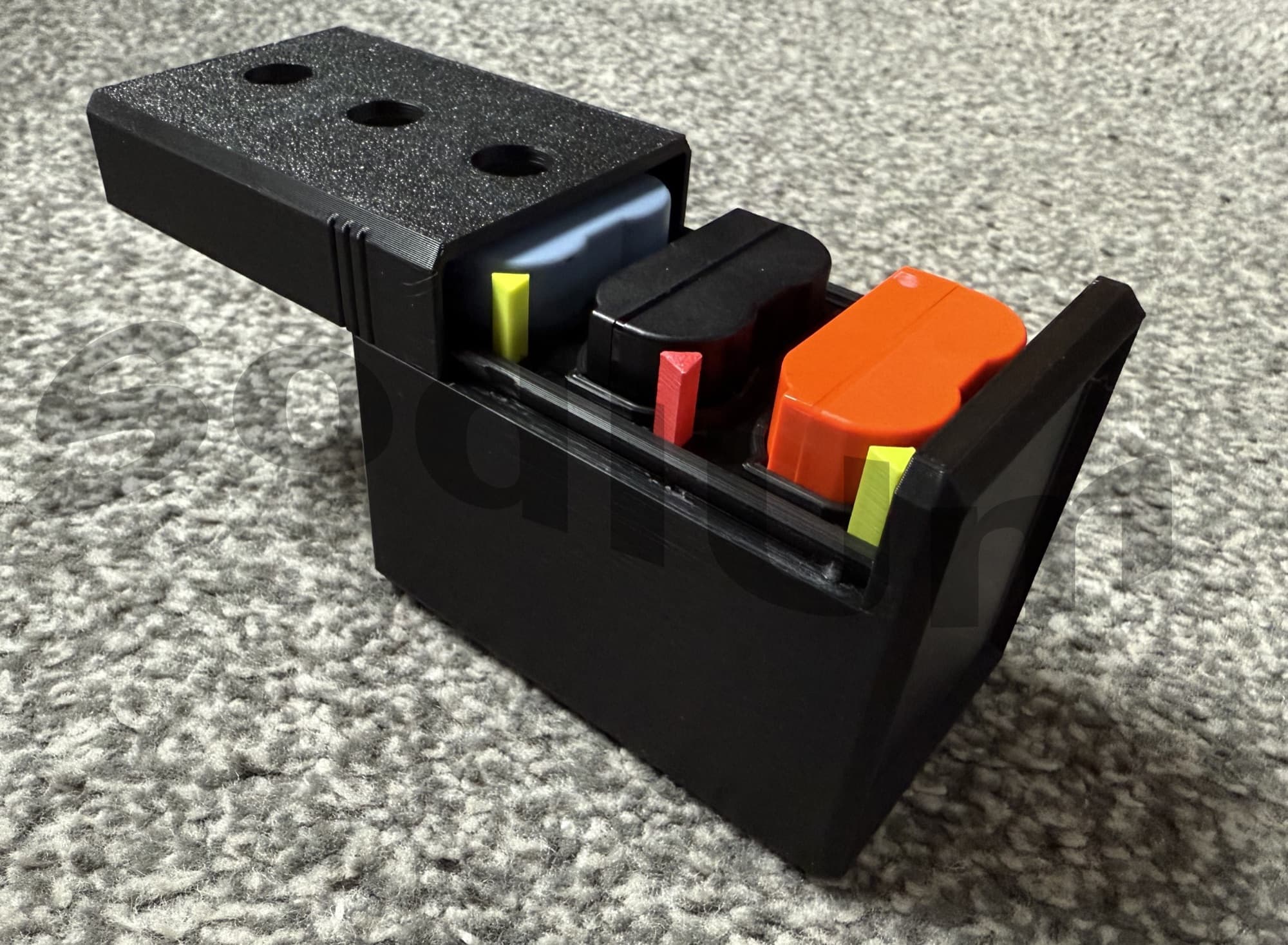 Nikon EN-EL15 battery storage box, printed and open, holding three batteries