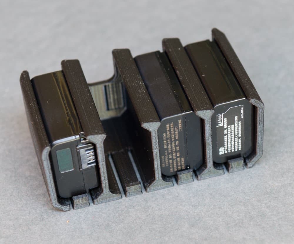 Sony NP-FW50 battery holder with batteries inserted